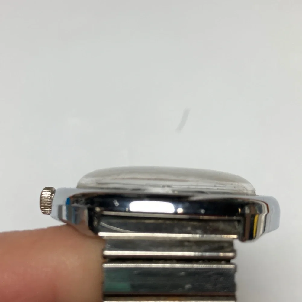 Vintage Timex black dial watch, works, stainless stretch bracelet